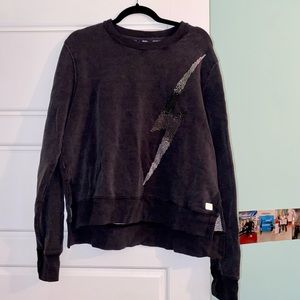 M sized crewneck sweater with gemstone lightening bolt design. Dark charcoal.